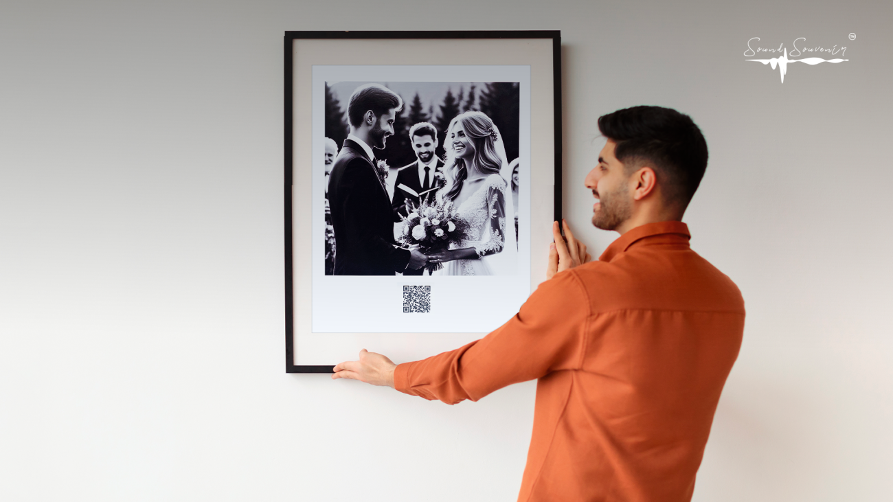 A close-up of a printed photo with a small QR Code visible in the corner.